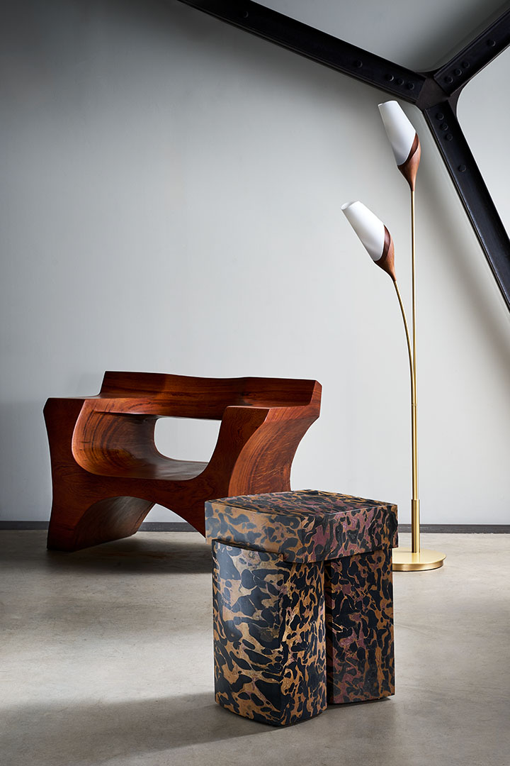 José Zanine Caldas wooden armchair, Roberto Sironi marble low table and Joe Armitage floor lamp